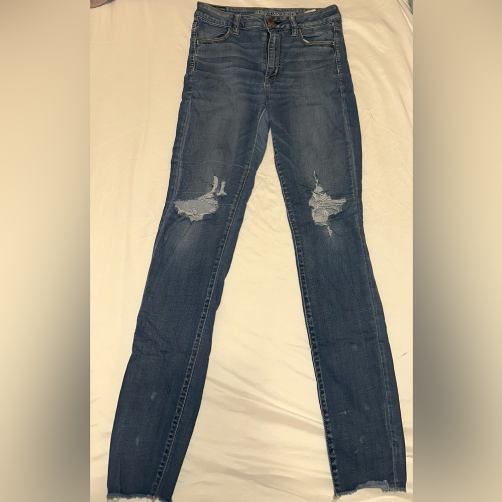 Distressed Blue Jeans
